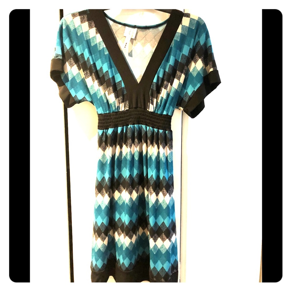 Beautiful stretchy 💙🖤 work or play dress